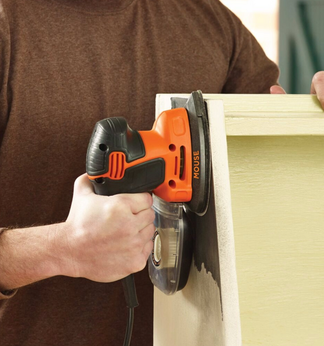 BLACK+DECKER mouse sander on furniture